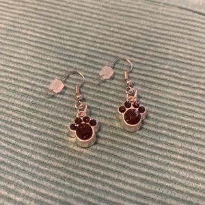 Dark purple dangle paw print earrings